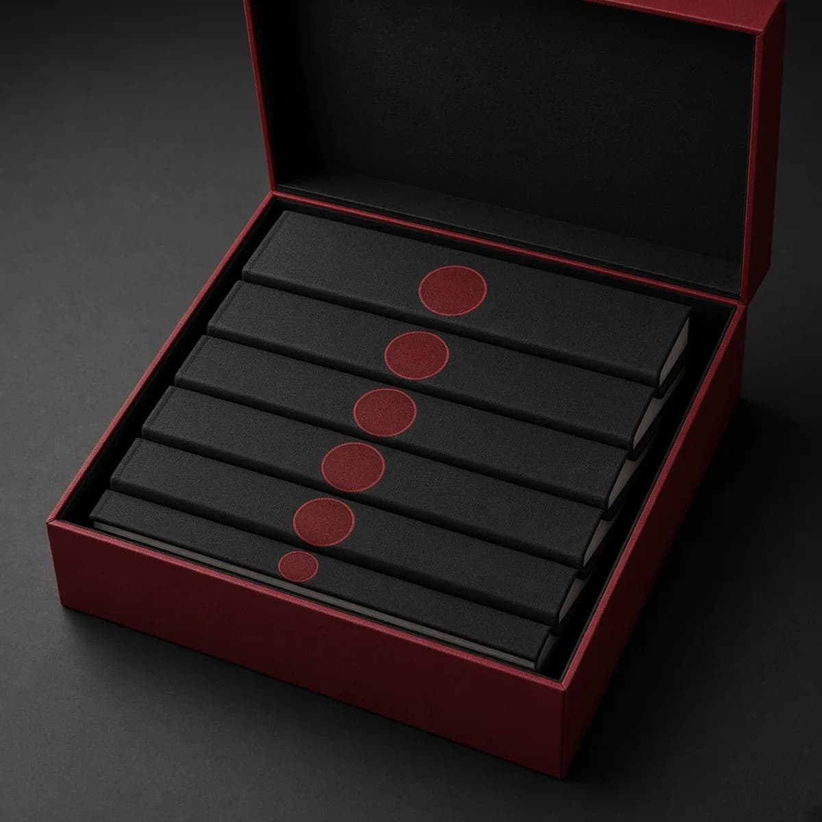 Kodansha Akira 35th anniversary box set with six hardcovers and an art book. Catalog illustration.